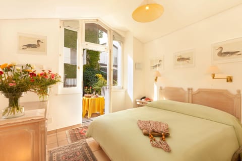 Double Room, Annex Building (Roccolo) | Minibar, in-room safe, individually decorated, individually furnished