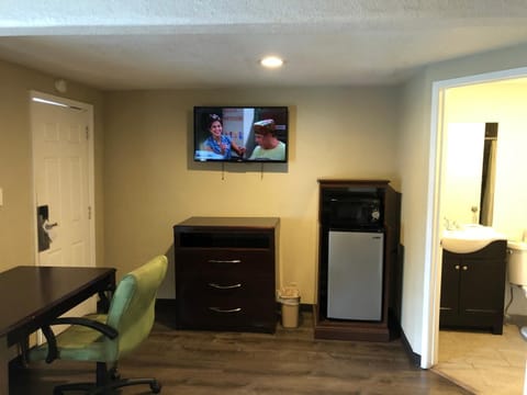 40-inch flat-screen TV with cable channels, TV