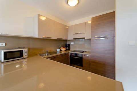 Comfort Apartment, 1 Bedroom, Terrace, Garden Area | Private kitchen | Full-size fridge, microwave, oven, stovetop