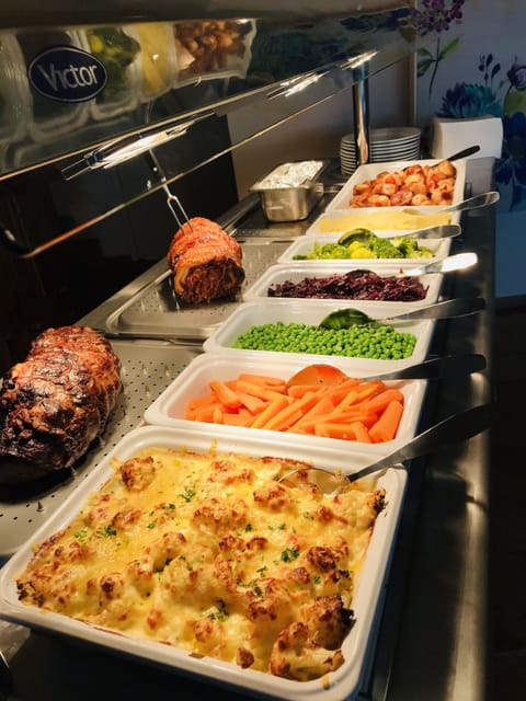 Breakfast, lunch, dinner served; local cuisine, garden views