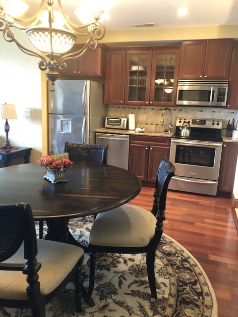 Promenade One Bedroom Suite | Private kitchen | Full-size fridge, microwave, stovetop, dishwasher