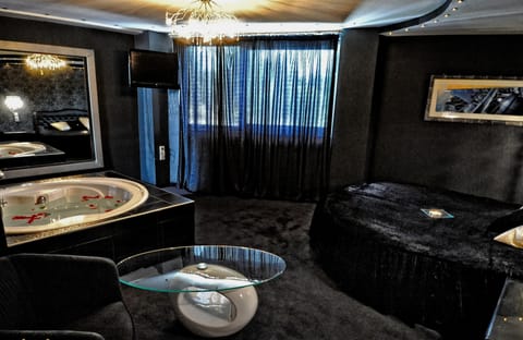 Suite | Individually decorated, blackout drapes, soundproofing, rollaway beds