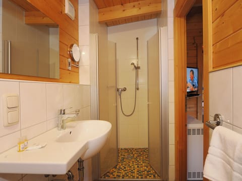 Bungalow | Bathroom | Shower, hair dryer, towels, toilet paper