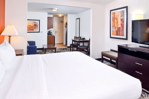 Suite, 1 King Bed, Non Smoking | Desk, blackout drapes, iron/ironing board, rollaway beds