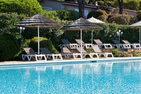 Seasonal outdoor pool, open 9:00 AM to 7:00 PM, pool umbrellas