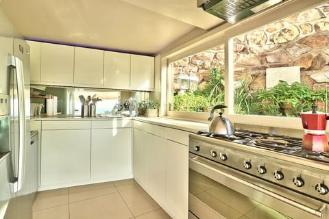 Luxury House | Private kitchen | Full-size fridge, microwave, oven, stovetop