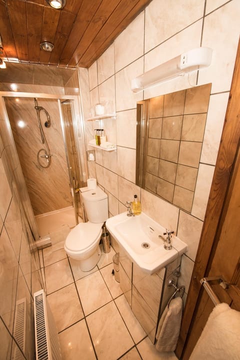 Standard Double Room, 1 Double Bed, Private Bathroom (Not in room) | Bathroom | Shower, rainfall showerhead, free toiletries, hair dryer