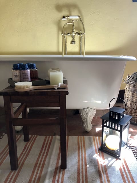 Studio Suite | Bathroom | Designer toiletries, hair dryer, bidet, towels