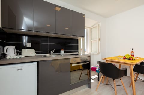 Standard Apartment, 1 Bedroom, Terrace | Private kitchen | Fridge, electric kettle, cookware/dishes/utensils