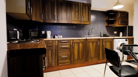 Standard Apartment | Private kitchen | Fridge, microwave, oven, stovetop