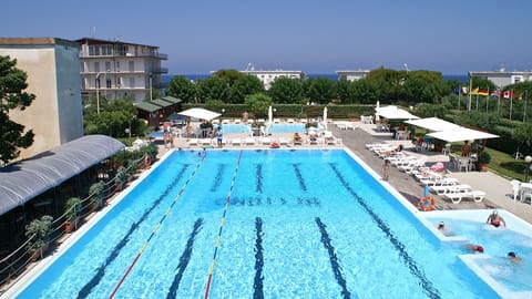 Seasonal outdoor pool, open 9 AM to 7 PM, pool umbrellas, sun loungers