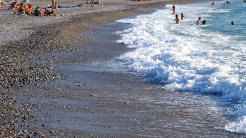 Private beach, sun loungers, beach umbrellas, windsurfing