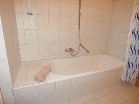 Family Condo, 1 Bedroom, Non Smoking, Garden View (Excluding 25 EUR cleaning fee) | Bathroom | Hair dryer, towels