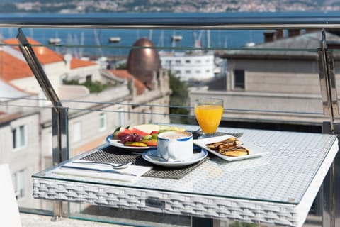 Daily buffet breakfast (EUR 15 per person)