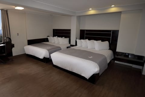 Suite, 2 Queen Beds | Premium bedding, down comforters, minibar, in-room safe