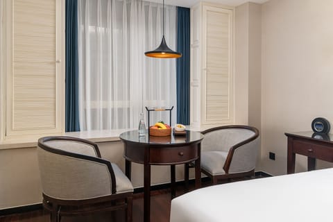 Deluxe Room, 1 King Bed | Premium bedding, down comforters, pillowtop beds, minibar