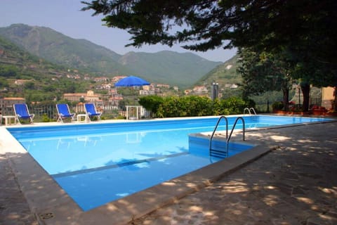 Seasonal outdoor pool, pool umbrellas, sun loungers