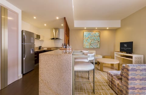 Suite, 1 King Bed, Non Smoking, City View | Private kitchen | Oven, coffee/tea maker, highchair