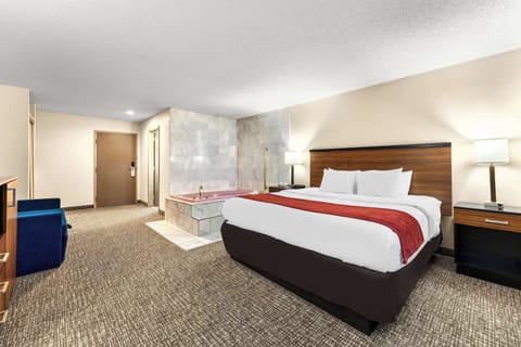 Suite, 1 King Bed, Non Smoking, Jetted Tub | Premium bedding, in-room safe, desk, laptop workspace