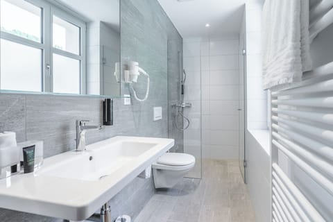 Deluxe Double Room Single Use | Bathroom | Eco-friendly toiletries, hair dryer, bathrobes, slippers