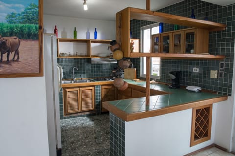 Suite, 2 Bedrooms | Private kitchen | Full-size fridge