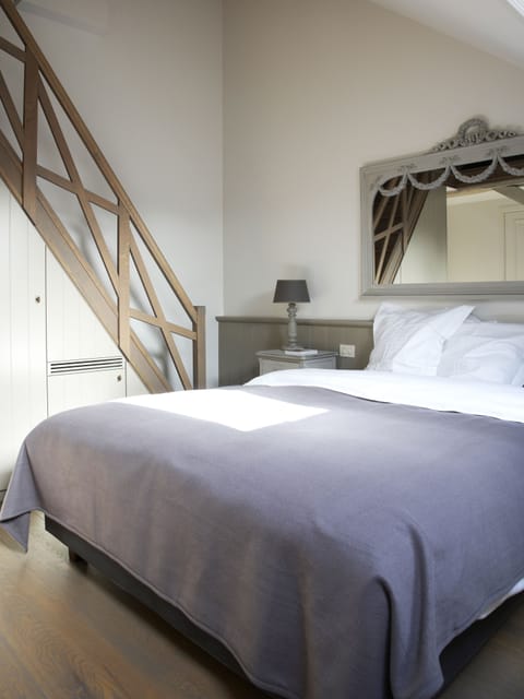 Down comforters, Select Comfort beds, minibar, desk