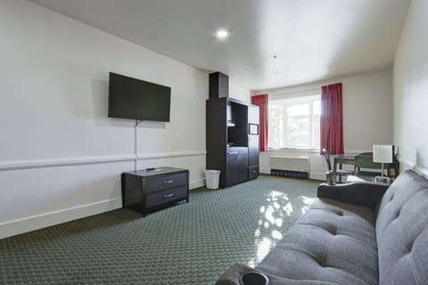 Deluxe Suite, 2 Queen Beds | Living area | Flat-screen TV