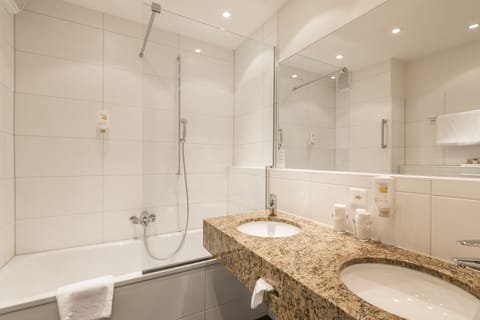 Standard Triple Room | Bathroom | Combined shower/tub, deep soaking tub, eco-friendly toiletries