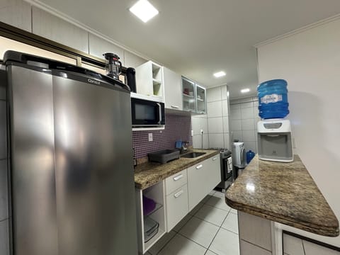 Standard Apartment, Sea View | Private kitchen | Full-size fridge, microwave, oven, stovetop