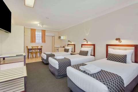 Room, 3 Twin Beds | Iron/ironing board, free WiFi, bed sheets