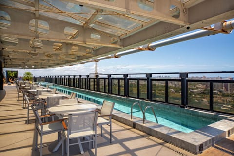 Outdoor pool, pool umbrellas, sun loungers