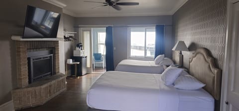 Signature Room, 2 Queen Beds, Partial Ocean View, Ground Floor | Free WiFi, bed sheets