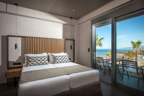 Standard Double or Twin Room, Sea View | Minibar, in-room safe, individually decorated, individually furnished