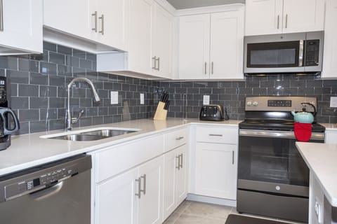 Apartment, 2 Bedrooms | Private kitchen | Full-size fridge, microwave, oven, stovetop