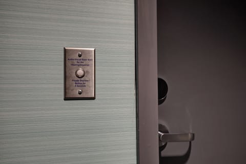 Hypo-allergenic bedding, desk, laptop workspace, blackout drapes