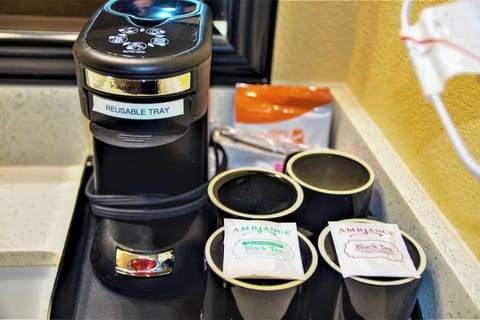 Premium bedding, desk, laptop workspace, blackout drapes