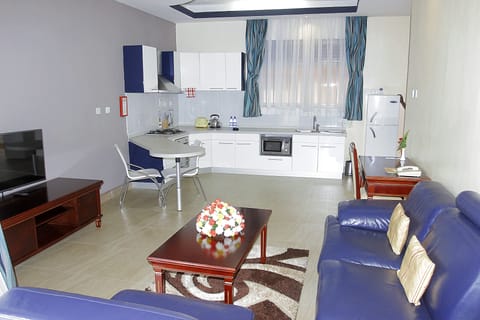 Suite, 1 Bedroom | Living area | 40-inch LCD TV with satellite channels, TV