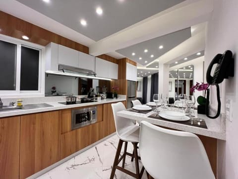 Luxury 4 bedroom Kitchen & Living Room | Private kitchen | Fridge, microwave, stovetop, espresso maker