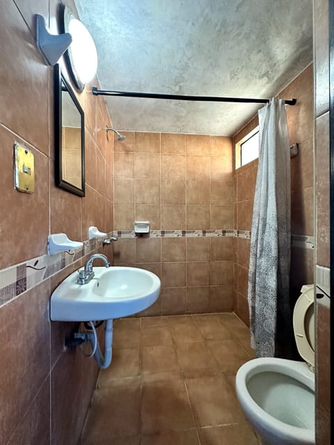 Standard Room | Bathroom | Shower, free toiletries, slippers, towels