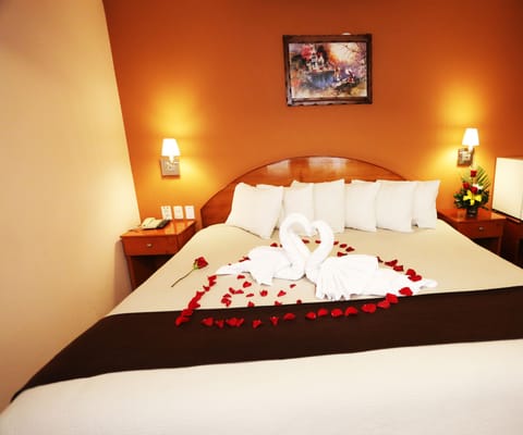 Double Room | Down comforters, minibar, in-room safe, individually furnished