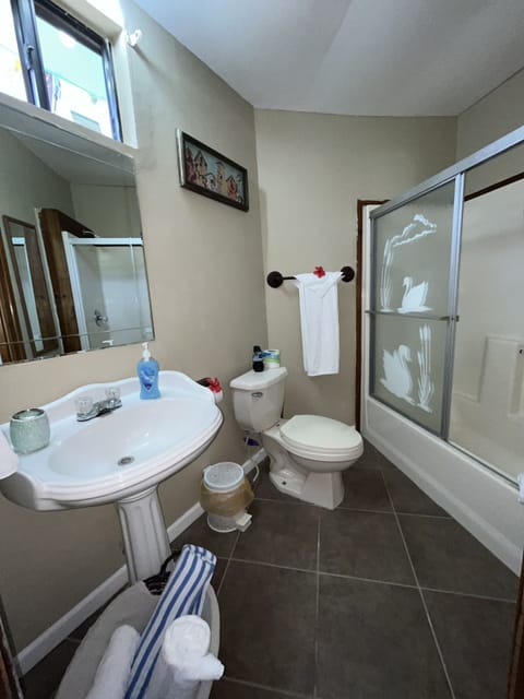 Deluxe Cabin, Multiple Beds, Ocean View, Beachfront | Bathroom | Shower, hydromassage showerhead, free toiletries, towels