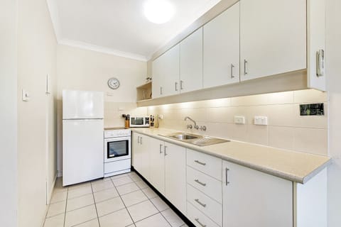 Two Bedroom Apartment | Private kitchen | Full-size fridge, microwave, oven, stovetop