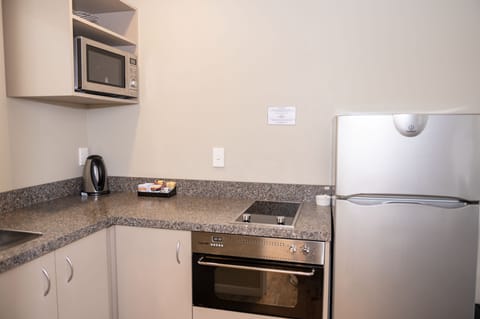 Apartment, 2 Bedrooms | Private kitchenette | Mini-fridge, microwave, electric kettle, toaster