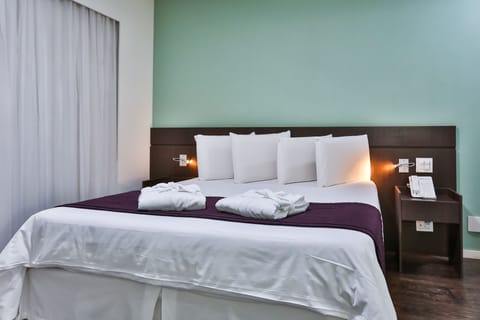 Premium Double Room Single Use, 1 Double Bed | In-room safe, laptop workspace, blackout drapes, free WiFi