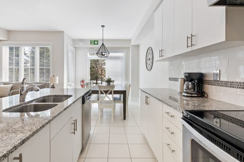 Luxury Townhome, 3 Bedrooms (48 Snowbridge - Pet Friendly) | Private kitchen | Full-size fridge, microwave, oven, stovetop