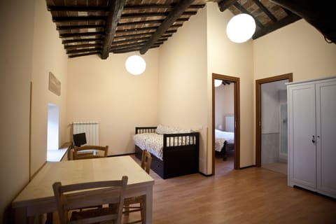 Deluxe Quadruple Room, Private Bathroom | Select Comfort beds, individually furnished, desk, laptop workspace