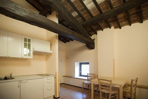 Deluxe Quadruple Room, Private Bathroom | Private kitchen | Coffee/tea maker, electric kettle