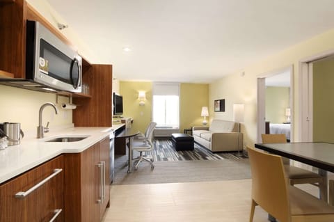 Suite, 1 King Bed, Non Smoking | Living area | Flat-screen TV, iPod dock