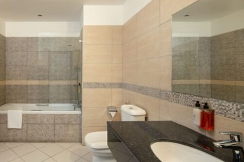 Suite | Bathroom | Separate tub and shower, free toiletries, bathrobes, slippers