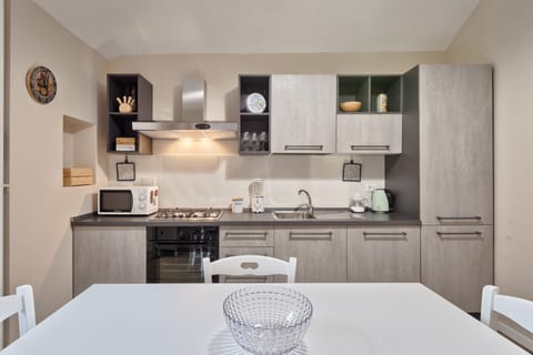 Apartment, 2 Bedrooms | Private kitchen | Full-size fridge, microwave, oven, stovetop